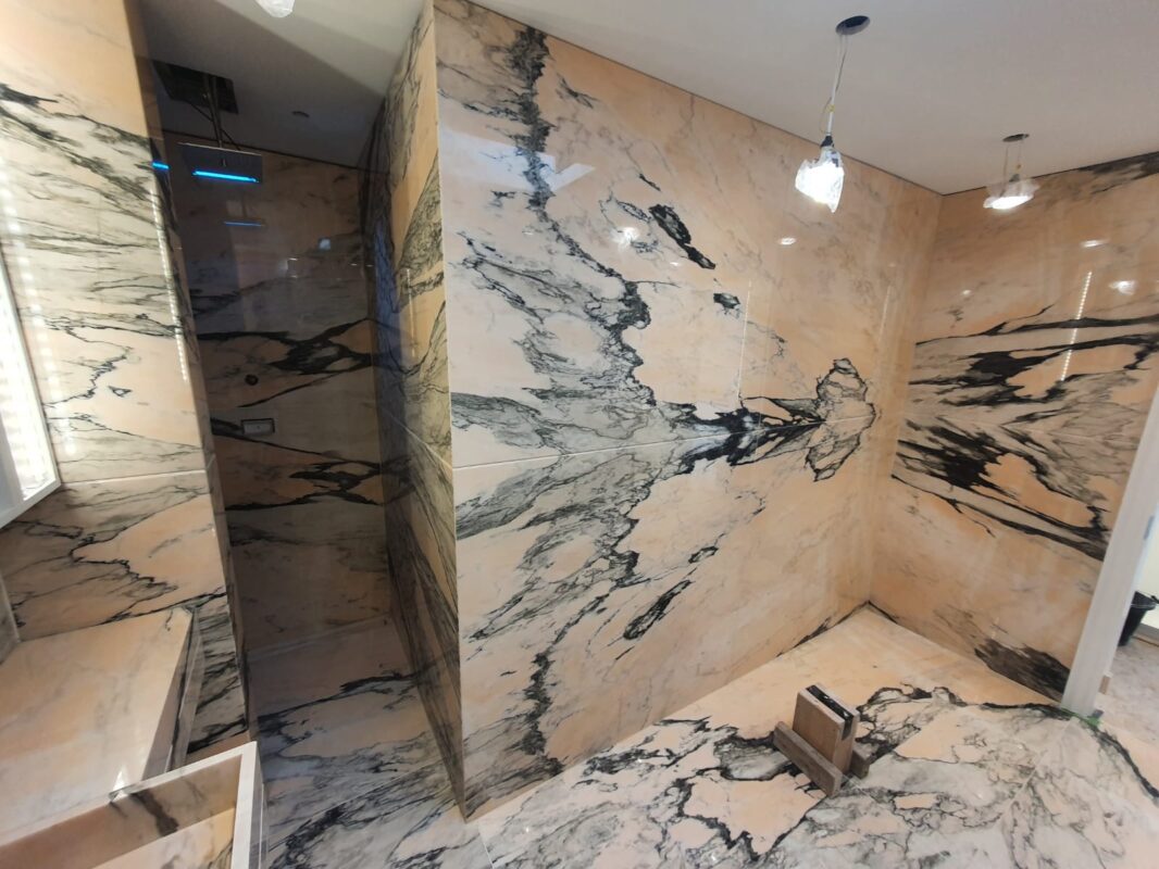 ROSA PORTUGAL MARBLE BESPOKE BATHROOM BOOKMATCHED WALLS FLOOR