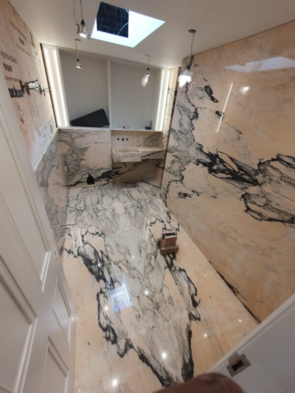 ROSA PORTUGAL MARBLE BESPOKE BATHROOM BOOKMATCHED WALLS FLOOR INSTALLATION